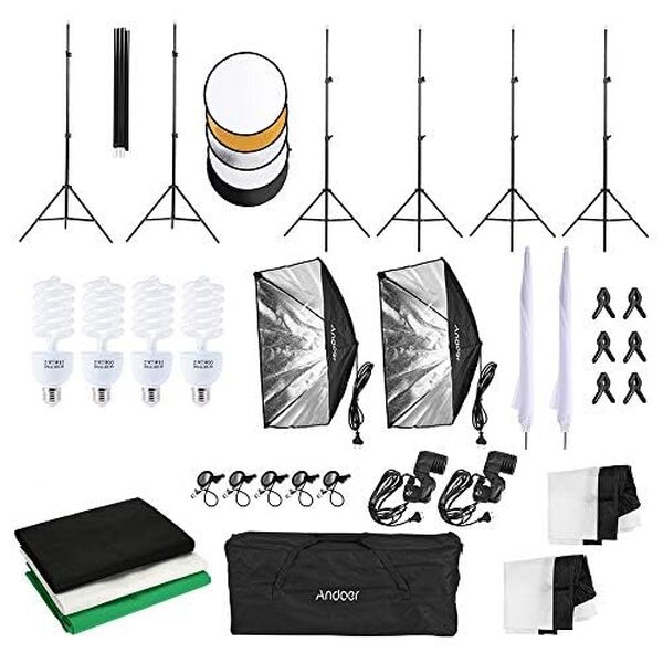 Profitez d'une analyse approfondie du kit d'éclairage Andoer avec son fond, support et accessoires photo. Découvrez sa capacité à améliorer vos prises de vue grâce à ses fonctionnalités puissantes et polyvalentes.